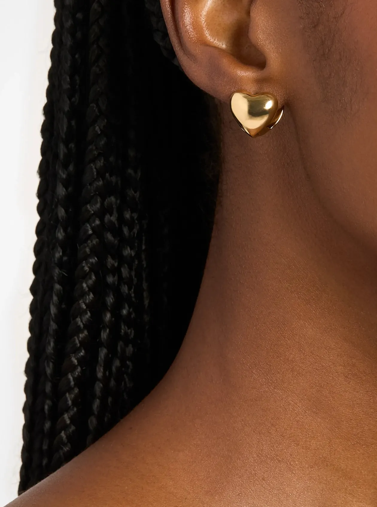Boucles d'oreilles huggies en forme de cœur bombé
