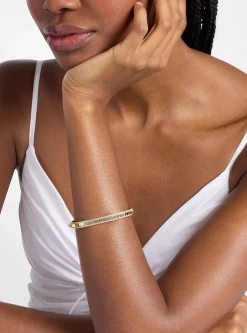 Bracelet en laiton doré à pierres pavées