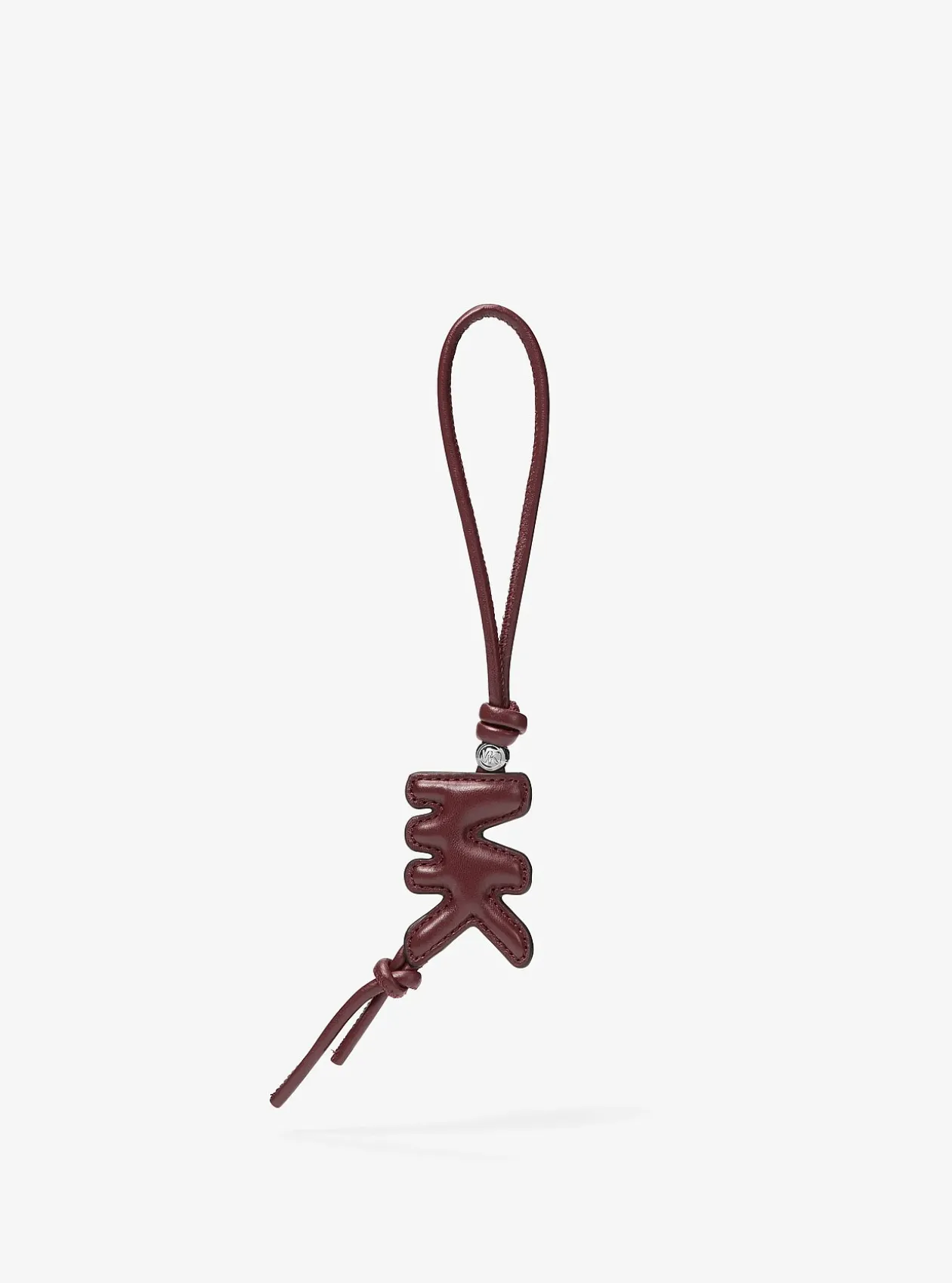Breloque de sac logo en cuir rembourré