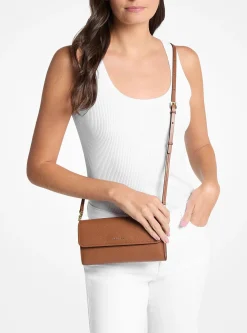 Petit sac à bandoulière pour smartphone Jet Set en cuir grainé