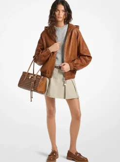 Veste à capuche en cuir texturé